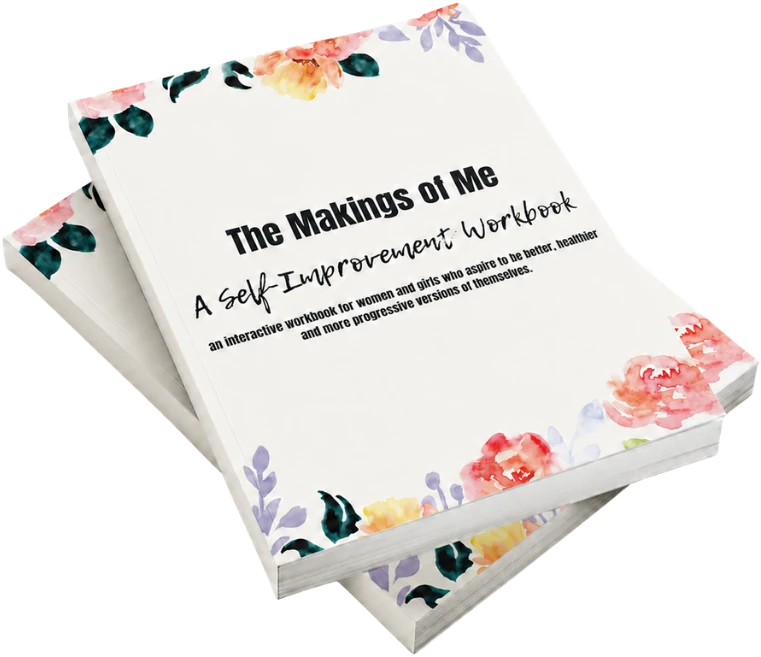 Two copies of The Makings of Me, a self-improvement workbook with a white cover framed in watercolor flowers